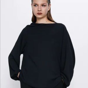 Unique neckline, asymmetrical blouse